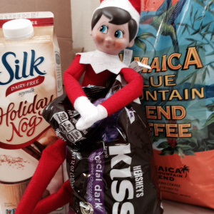 Tucker the merry elf is bringing in supplies for the festivities.